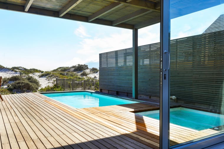 The pool and the separate heated pool set into the timber deck
